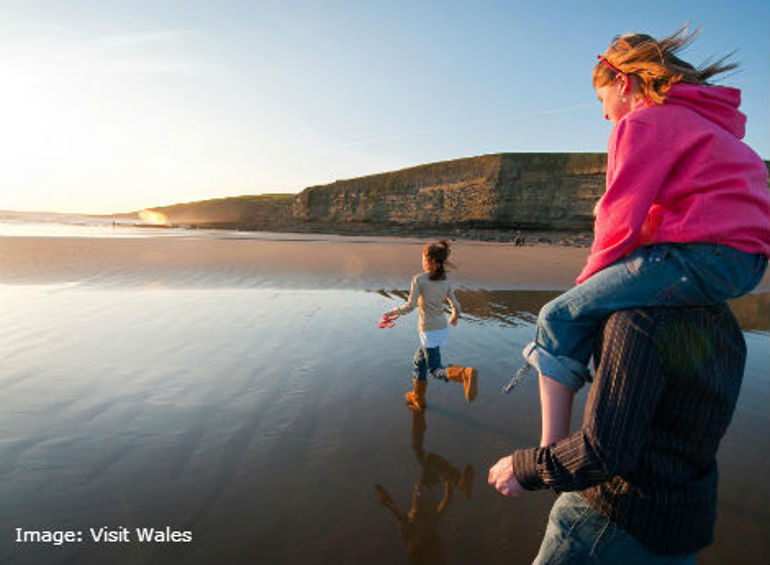 Family enjoying the beach. Image source: Visit Wales Family enjoying the beach. Image source: Visit Wales