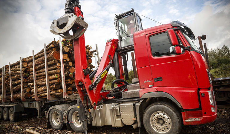 Red truck with timber Red truck with timber