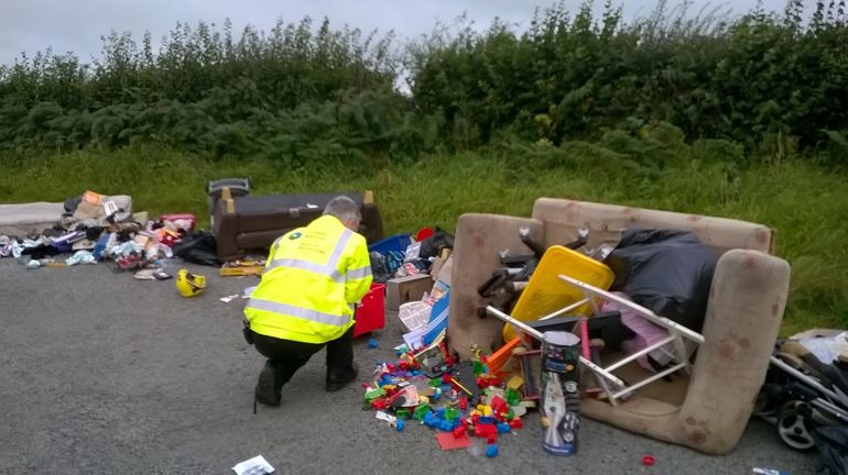 NRW staff investigating fly tipping mess NRW staff investigating fly tipping mess
