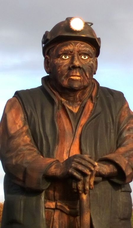 The Keeper of the Collieries is a nine foot tall, one and a half tonnes wooden statue at the Spirit of Llynfi Woodland site The Keeper of the Collieries is a nine foot tall, one and a half tonnes wooden statue at the Spirit of Llynfi Woodland site