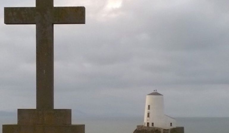 View of a cross at Newborough National Nature Reserve, North West Wales View of a cross at Newborough National Nature Reserve, North West Wales