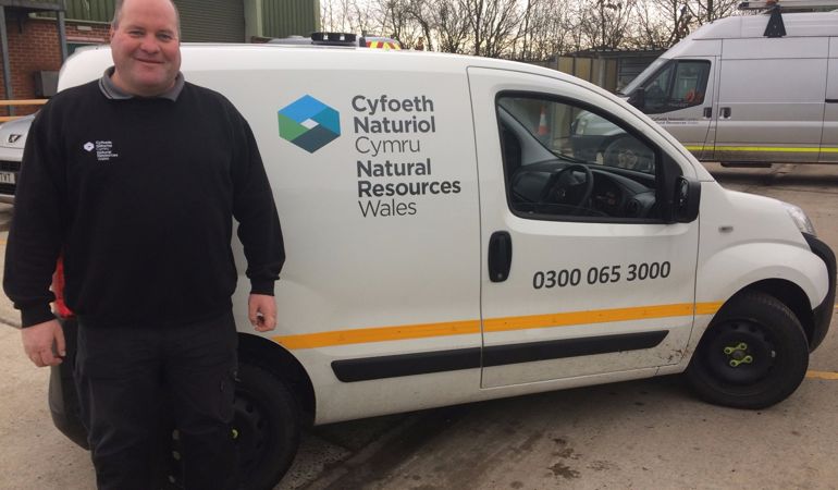 Allyn Hawkes next to his van Allyn Hawkes next to his van